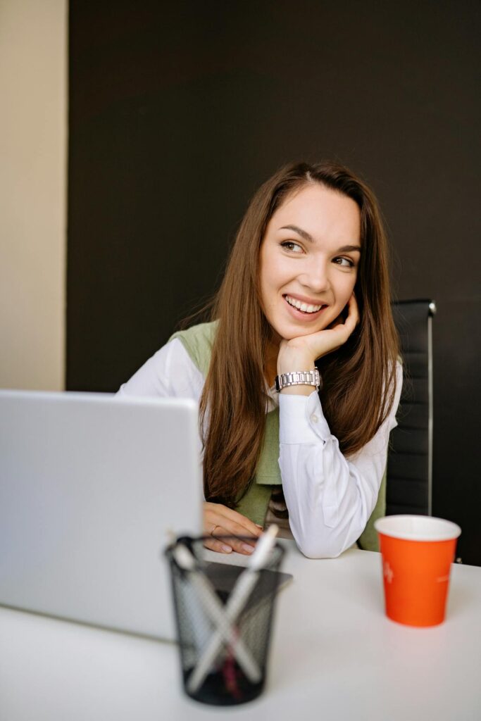 Student studying on computer for an online real estate class