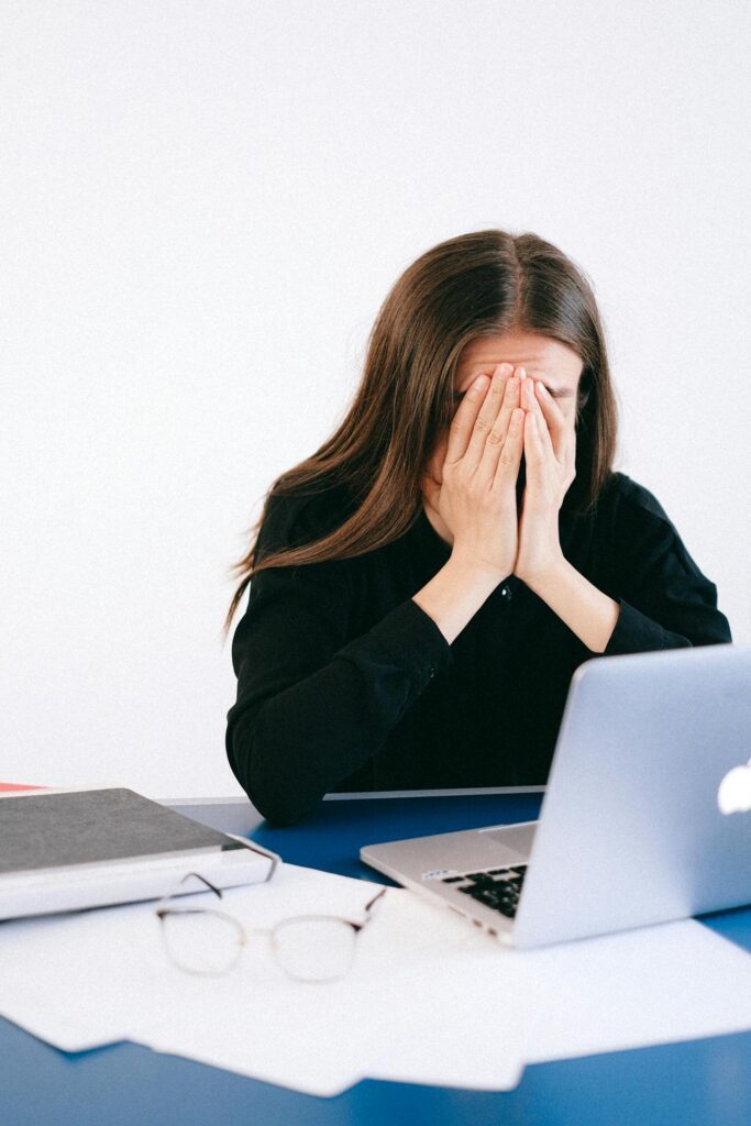 Frustrated student preparing for the real estate exam florida after a failed attempt
